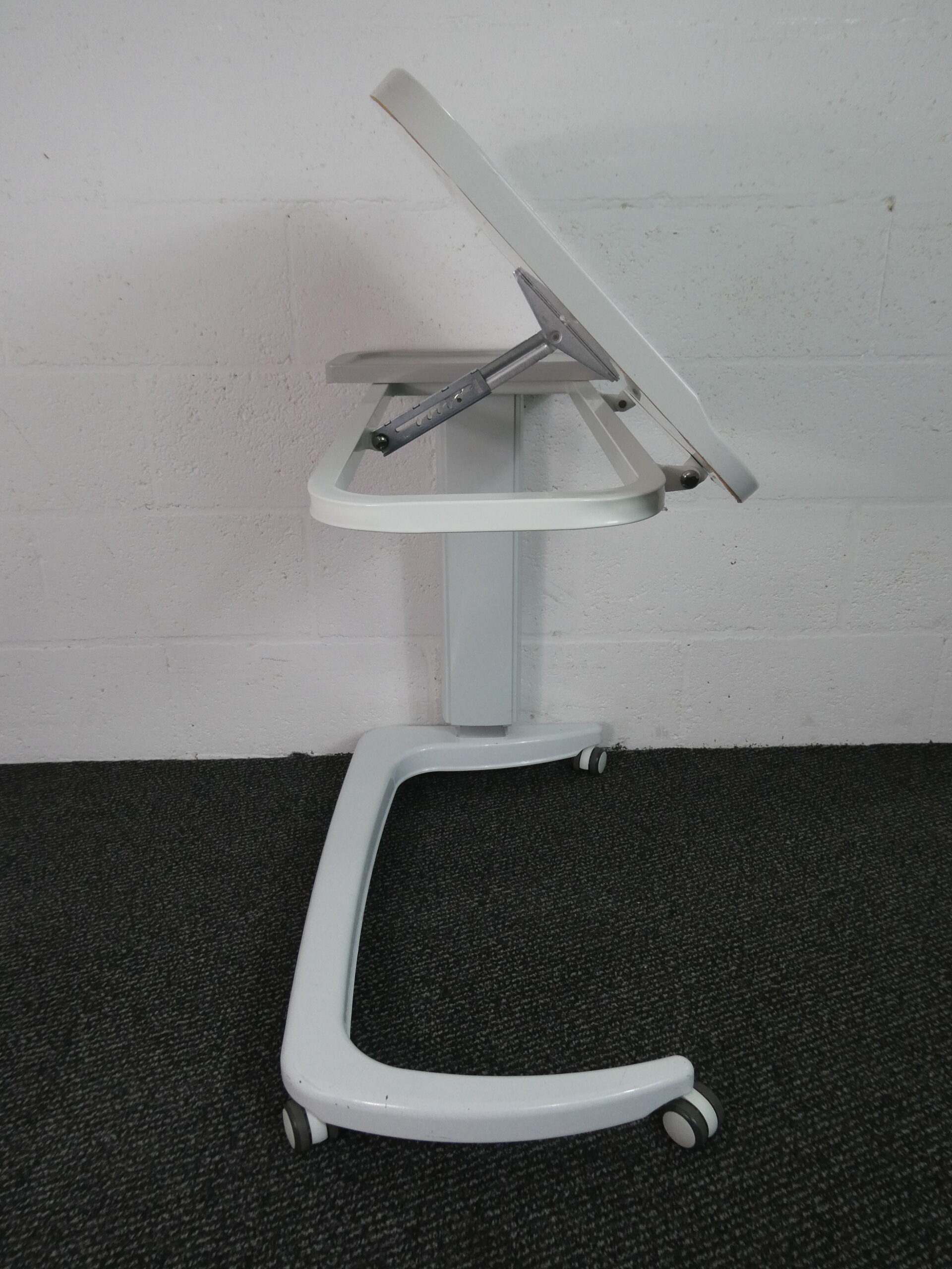 Table - Titling Overbed Table with Castors and Adjustable Height